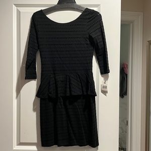 Black stretch cotton peplum dress